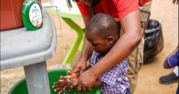 Child washing hands